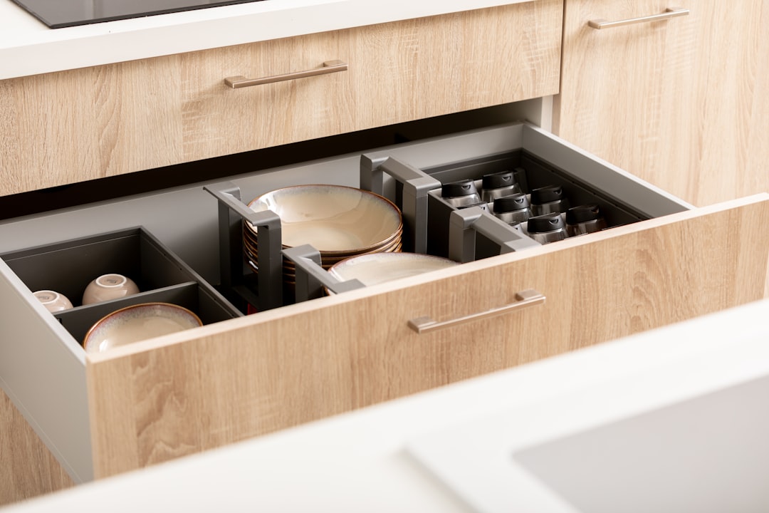 A well-organized kitchen with various storage solutions like shelves, baskets, and containers, showcasing a tidy and efficient space.