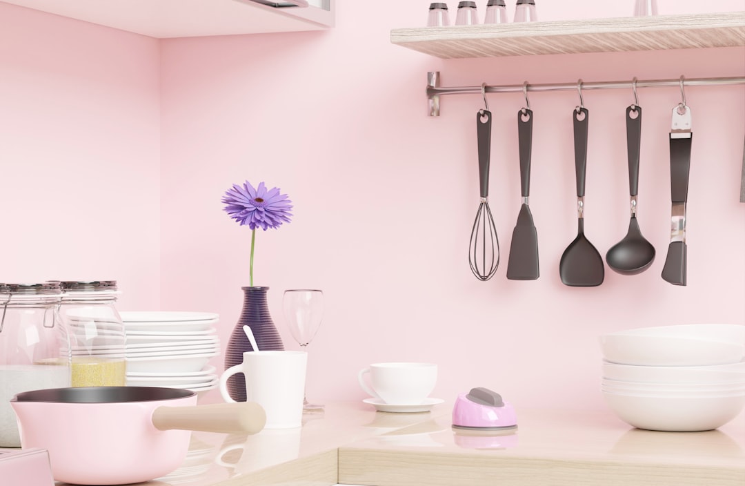 A collection of essential kitchen tools and utensils neatly arranged on a countertop, showcasing items like knives, cutting boards, measuring cups, and storage containers.