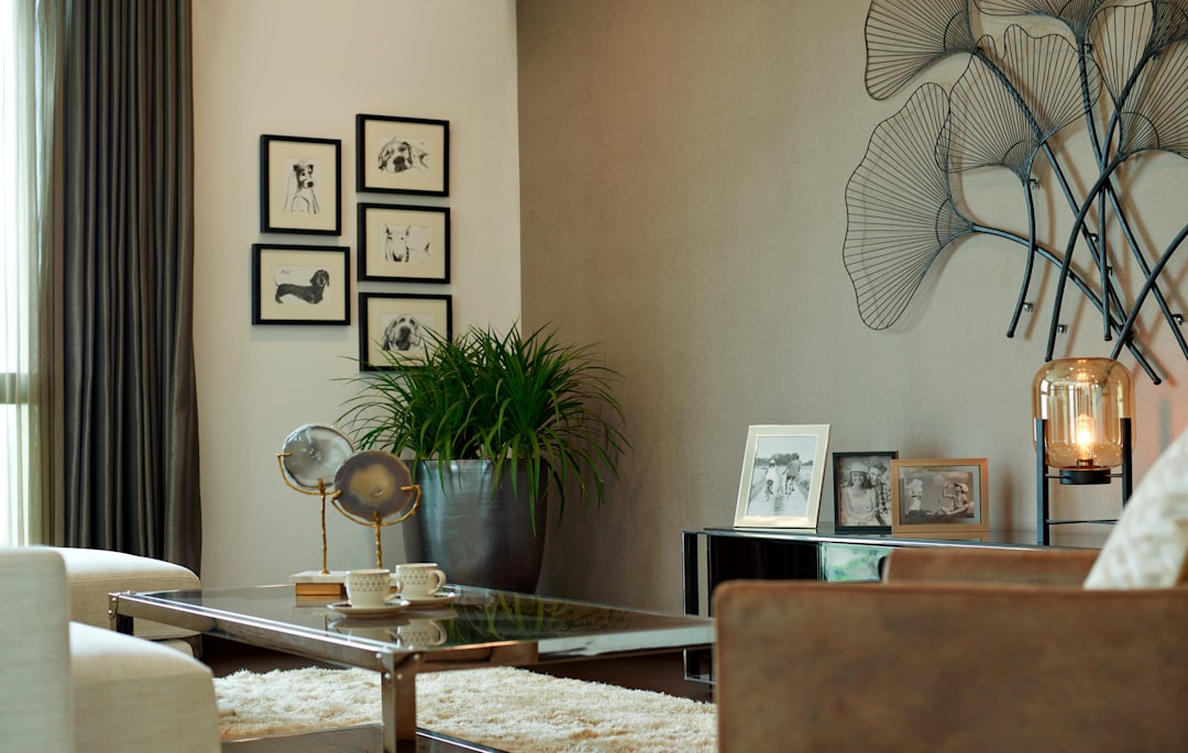 A beautifully styled living room with elegant furniture, tasteful accessories, and a cohesive color palette that conveys a luxurious feel.